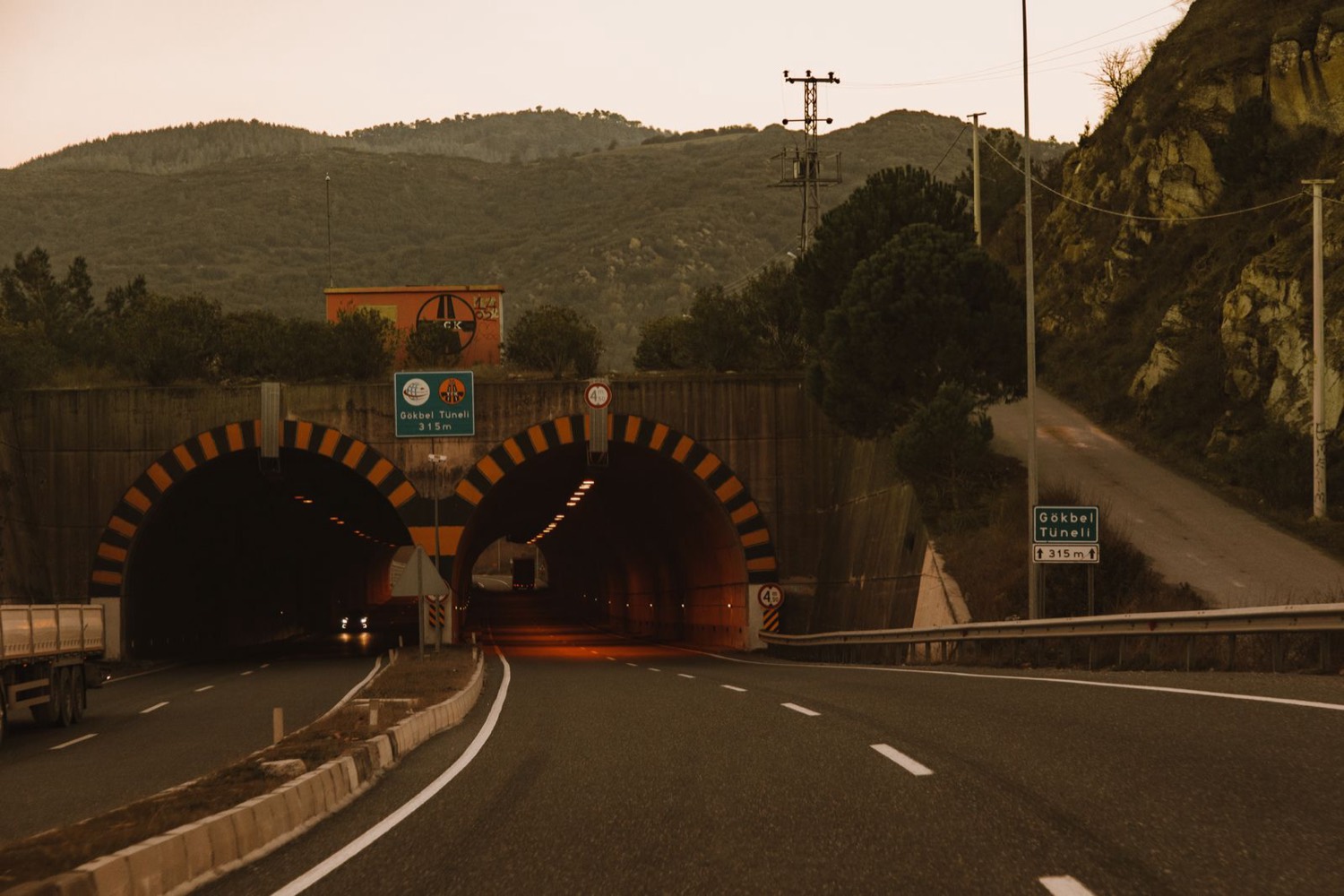 Road tunnel portal carved into a mountainside