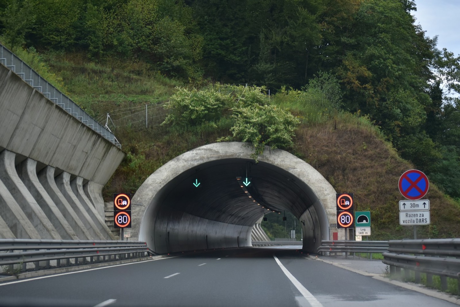 Highway crossing works: concrete tunnel portal and engineered road approach